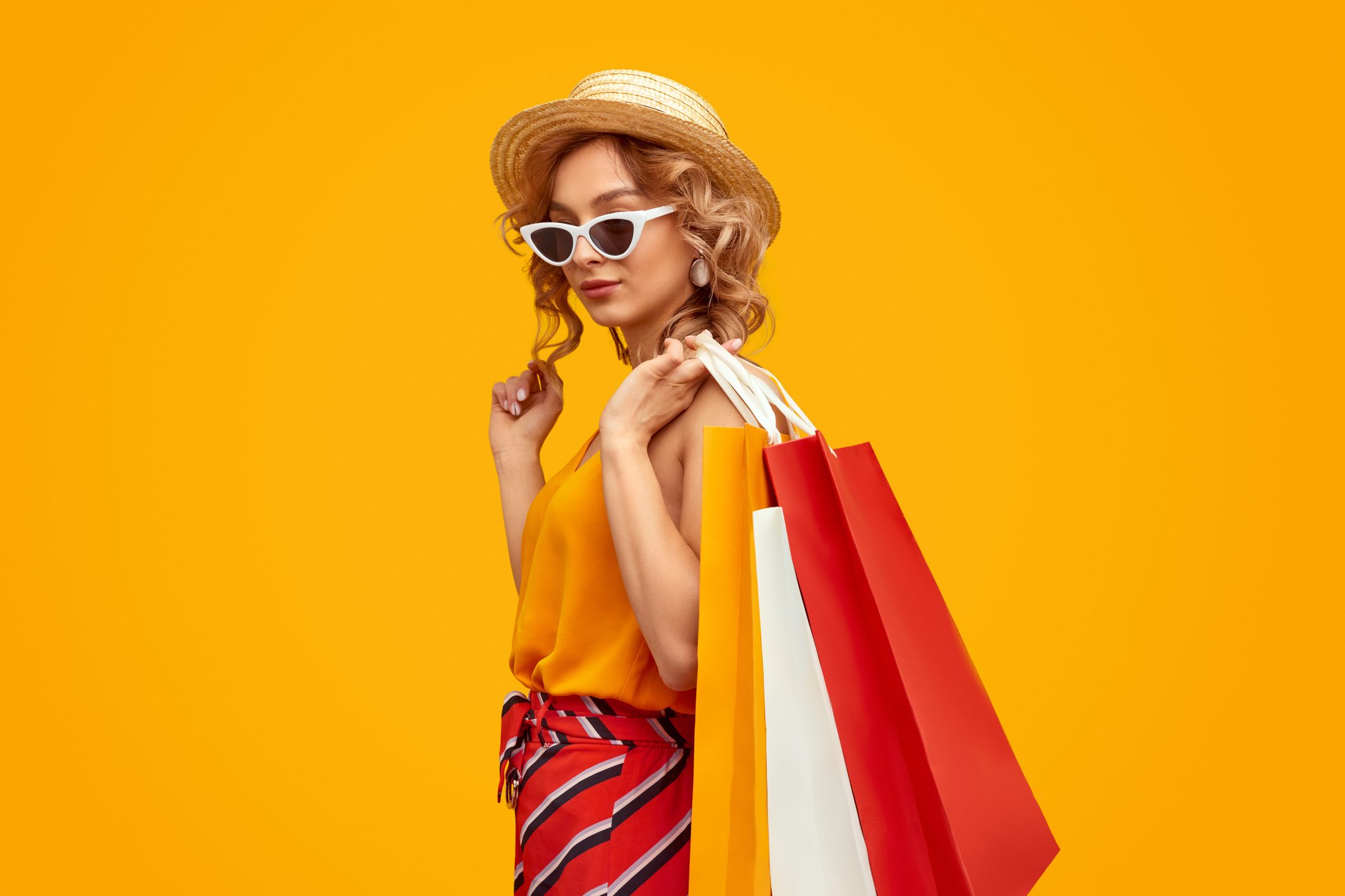 Trendy woman with shopping bags