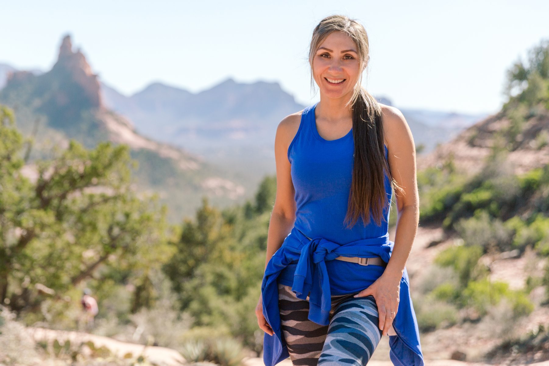Beautiful middle aged woman hiking in Sedona.