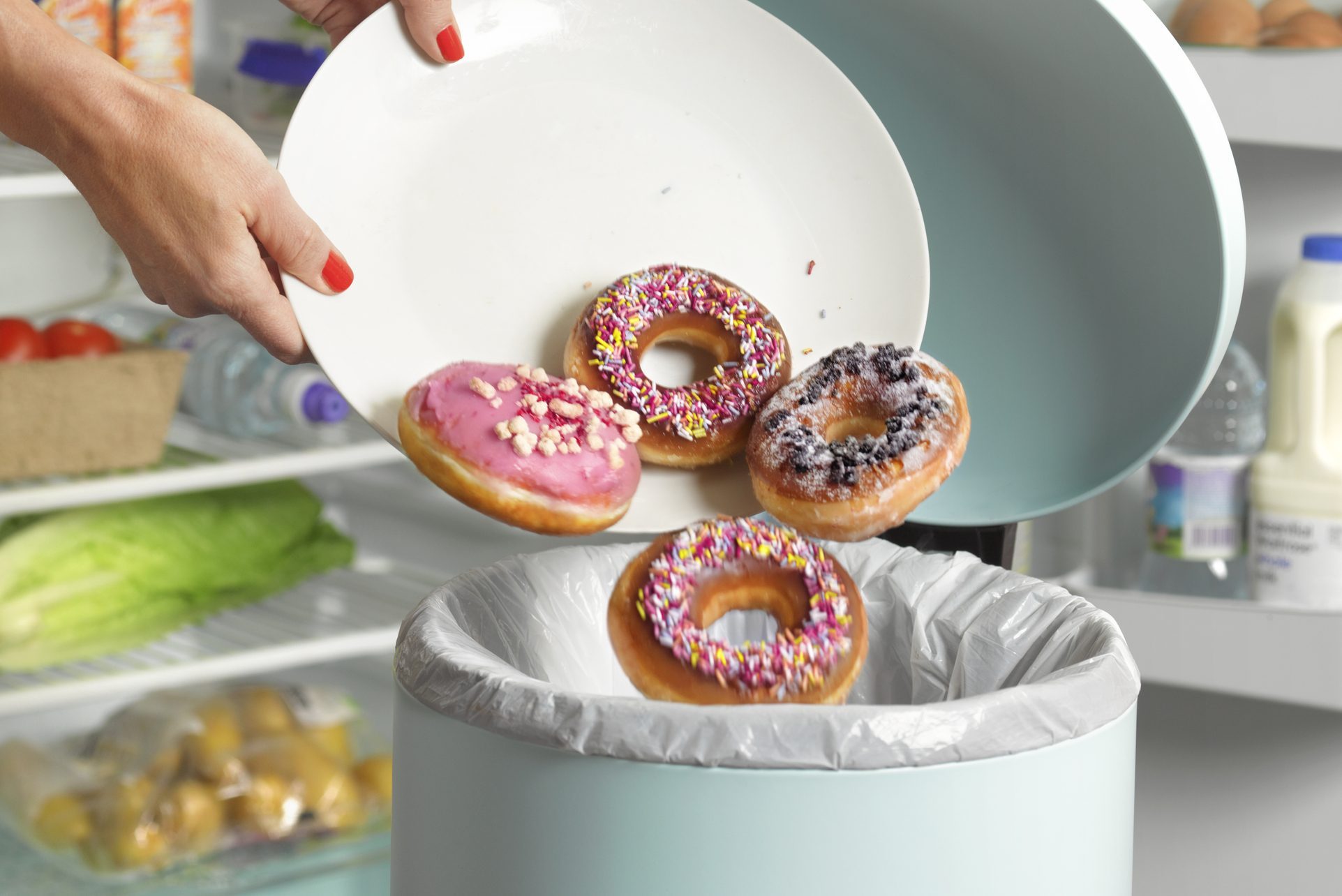 Dieter throwing away donuts