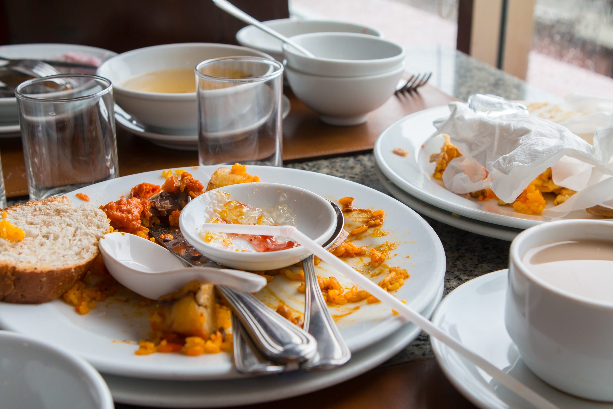 Leftover food on the table.