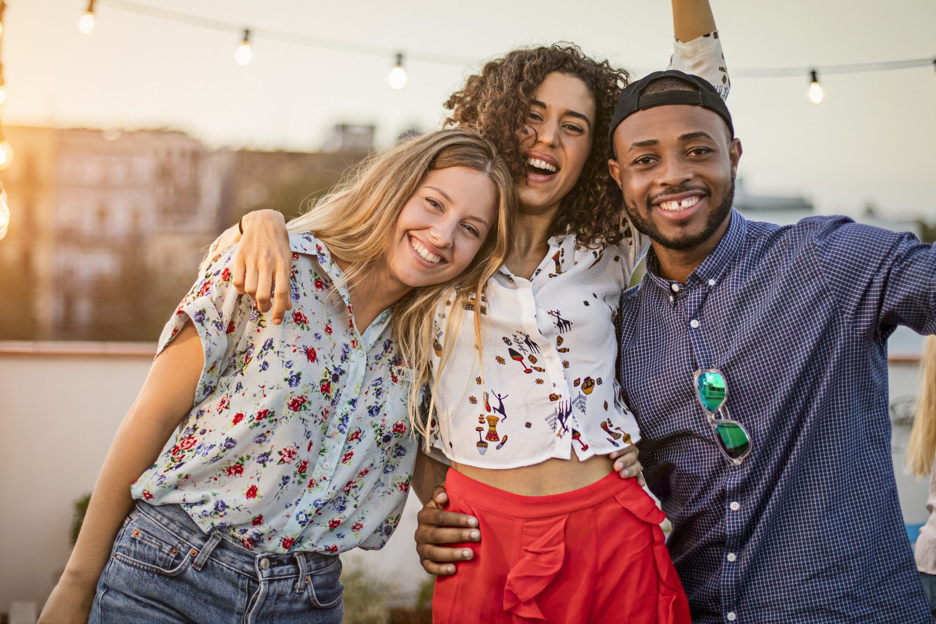 Portrait of friends enjoying in terrace party