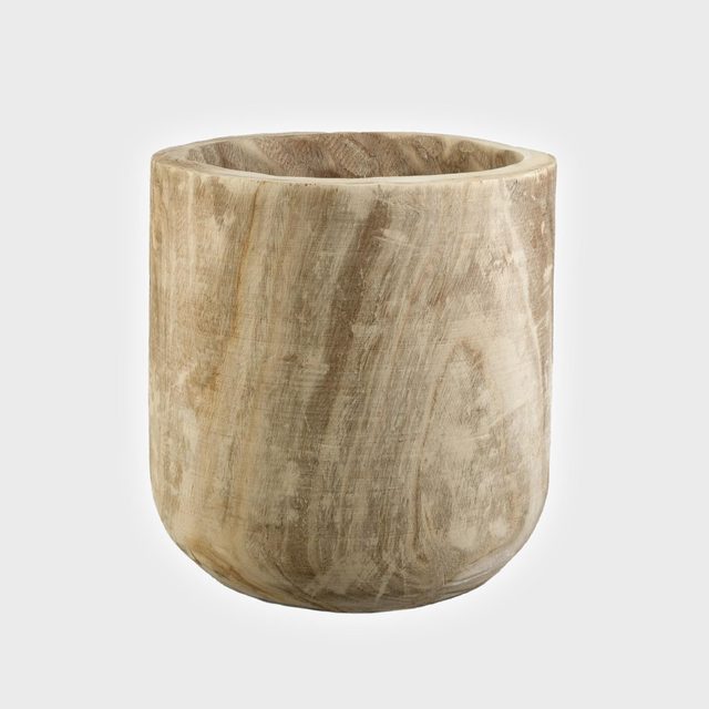 Wooden cylindrical planter with a natural grain texture, standing upright against a plain white background.