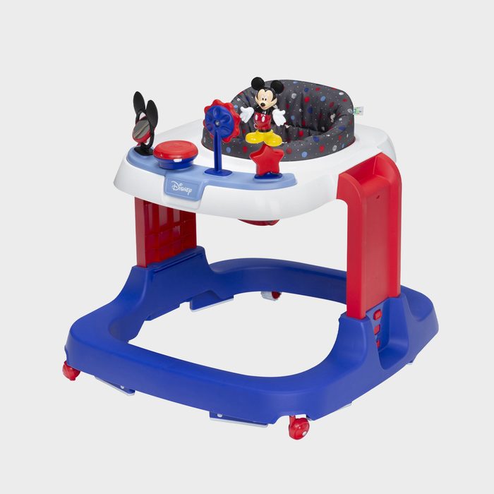 Baby walker features toys and a seat, surrounded by a blue and red framework, set against a plain white background.