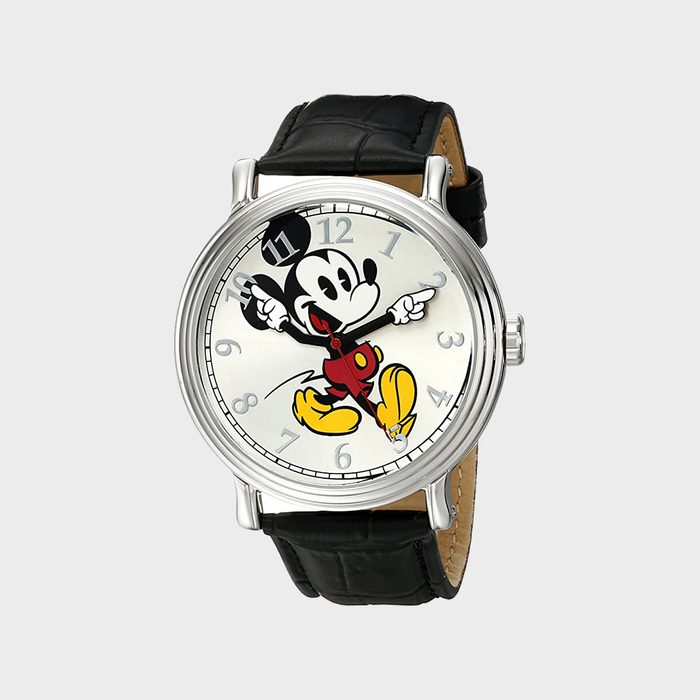 Watch displays cartoon character pointing as clock hands; numbers encircle face; black leather strap against plain background.