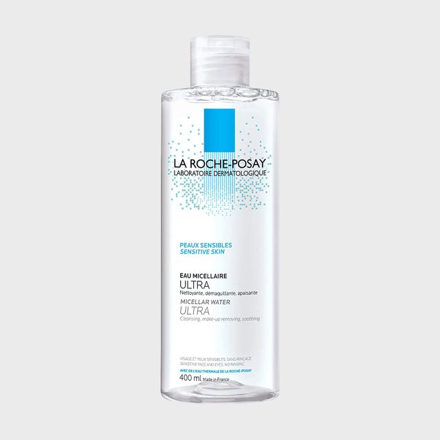 Bottle displays micellar water with label text detailing brand â€œLa Roche-Posayâ€ and features for sensitive skin; transparent with a white and blue design.