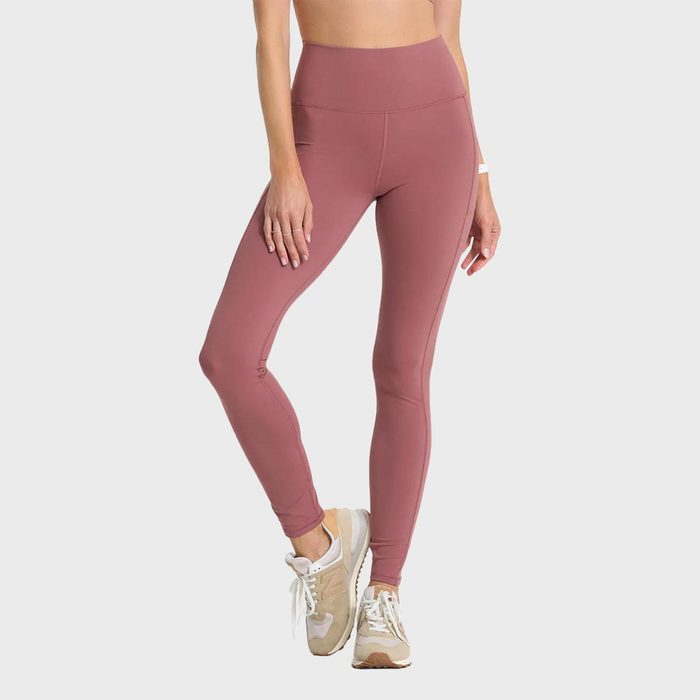 Leggings worn by a standing person, with hands at sides, in a neutral background.