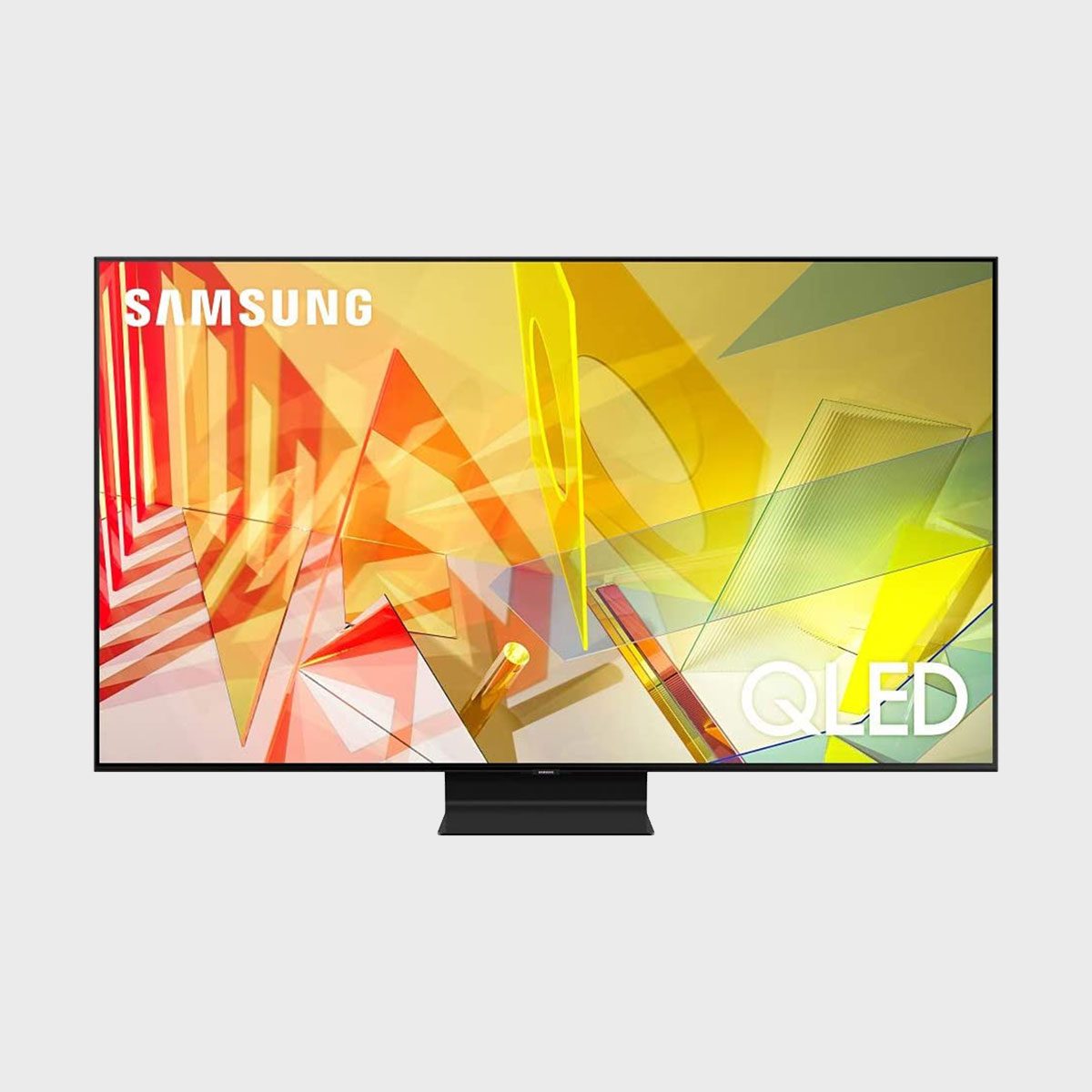 Television displaying colorful geometric shapes, featuring the text "SAMSUNG QLED," set against a plain white background.