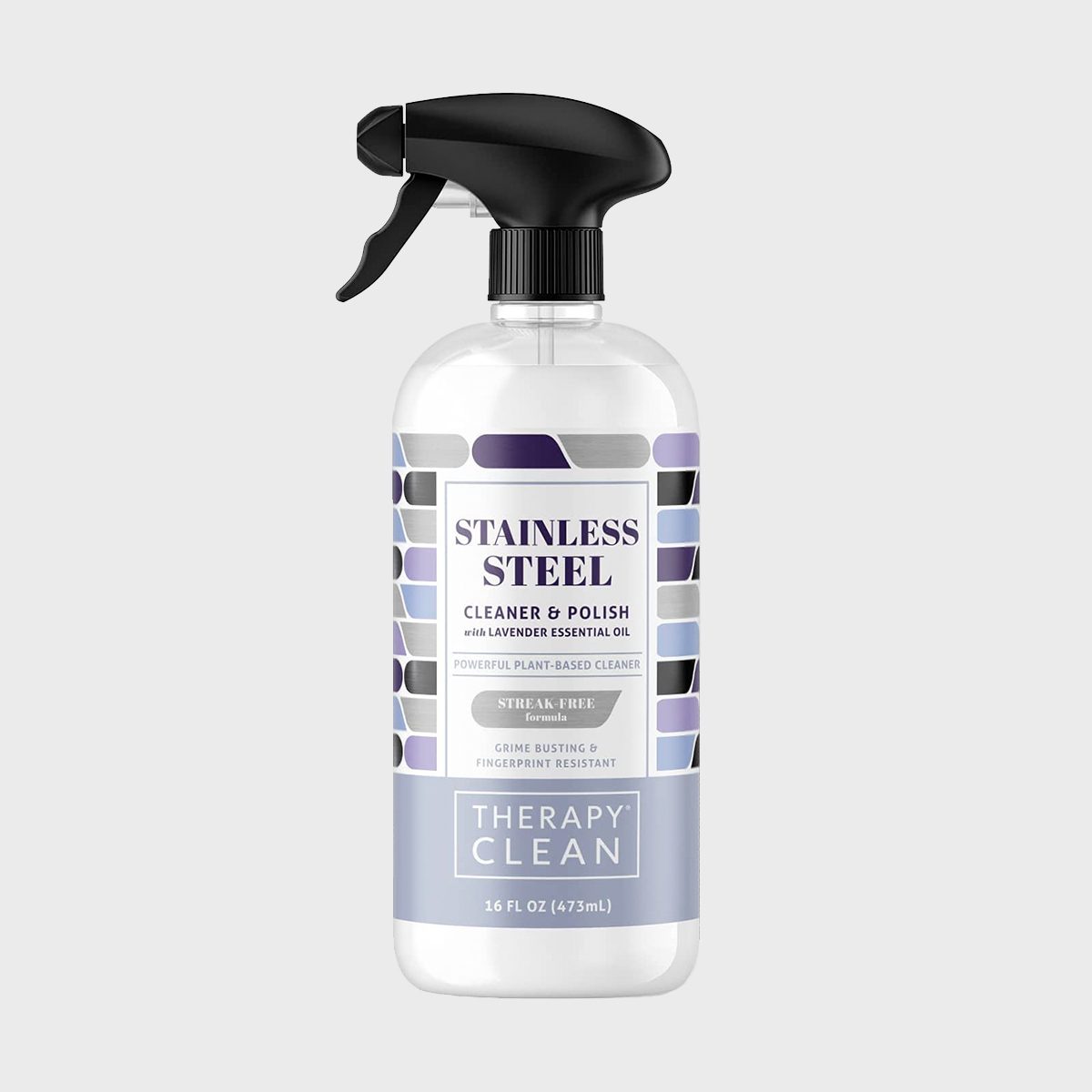 A spray bottle labeled "Stainless Steel Cleaner & Polish" with lavender essential oil, featuring a black nozzle and geometric patterns, stands on a white background.