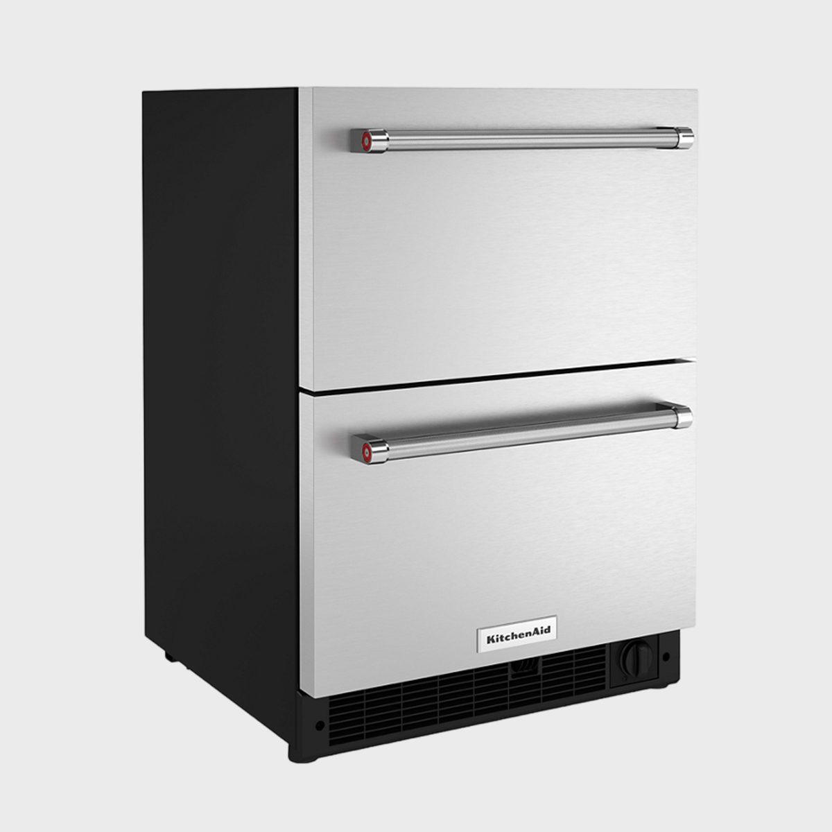 Refrigerator features two stainless steel drawers, with a silver handle each, in a plain setting. The brand label reads "KitchenAid."