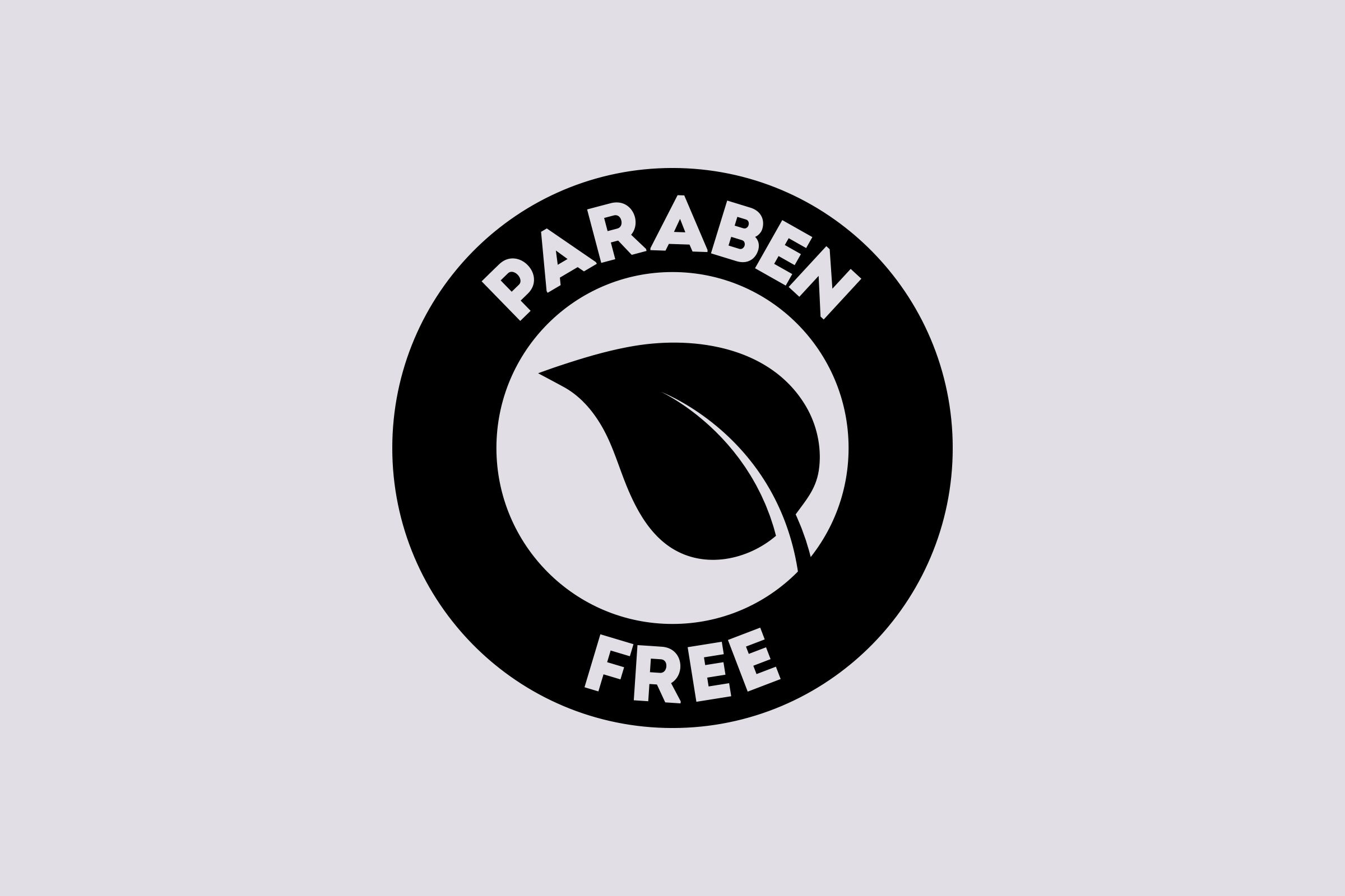 Leaf surrounded by the words "PARABEN FREE" in a circular black emblem on a light gray background.