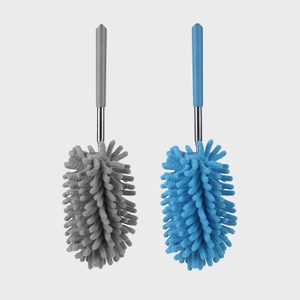 Two fluffy, microfiber dusters, one gray, one blue, with handles, are displayed against a plain white background.