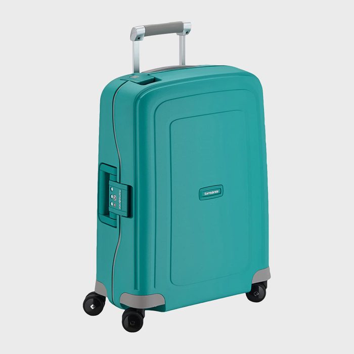 Turquoise suitcase with four wheels stands upright; telescopic handle extended. Brand name 