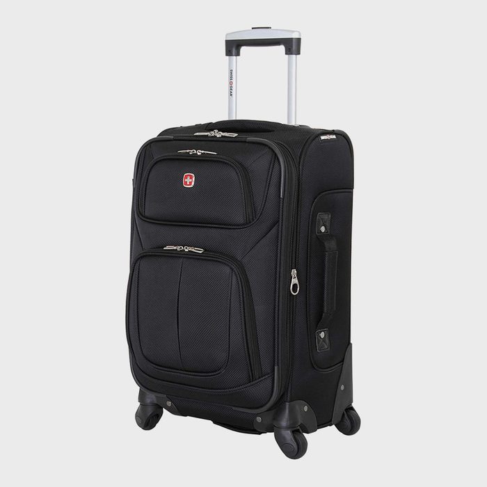 Black suitcase extends handle, situated on four wheels, against a plain background. The front features two zippered pockets with a small red emblem.