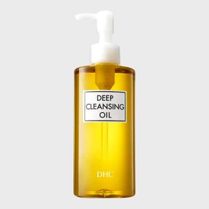 A pump bottle dispenses cleansing oil, labeled 