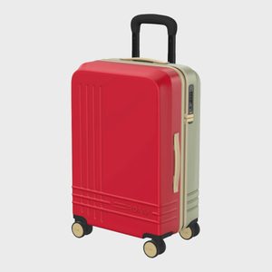 Red and beige suitcase stands on four wheels with a black handle, next to plain background. Text: 