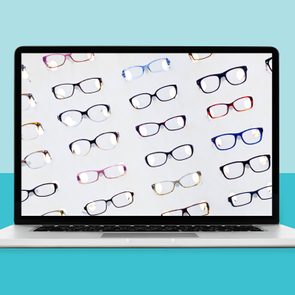 Laptop screen displays various eyeglasses in different colors and styles, set against a light background, with a cyan-colored context.