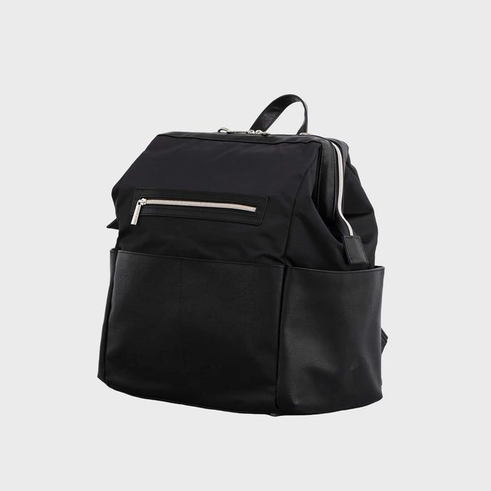 A black backpack with a front zippered pocket stands against a plain gray background.