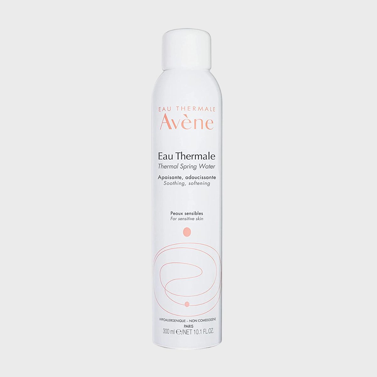 A white spray can displays "AvÃ¨ne Eau Thermale," offering soothing, softening thermal spring water for sensitive skin, with minimalist graphics and text.
