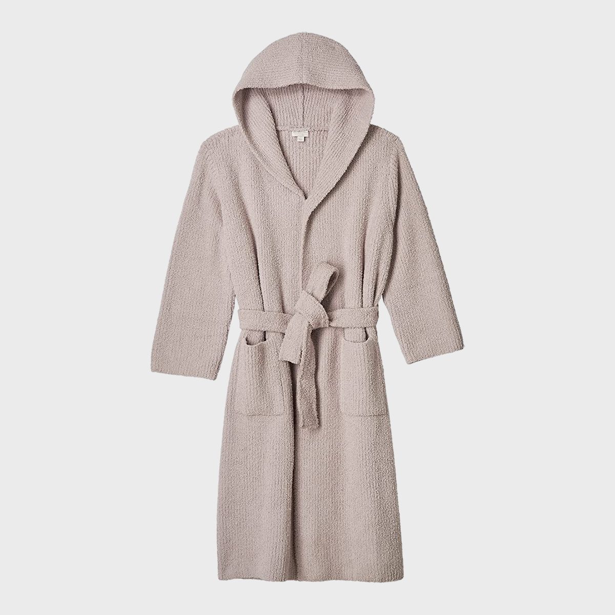 A hooded bathrobe hangs with a tied belt, featuring a soft, textured fabric against a plain white background.