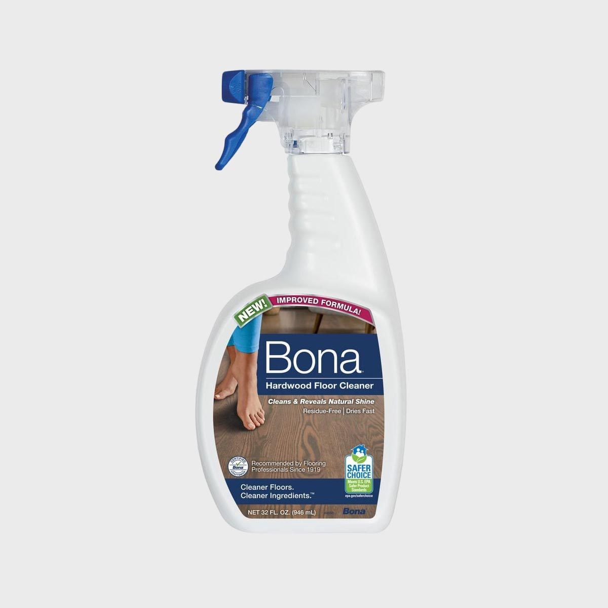 Spray bottle displays hardwood floor cleaner label; "Bona" brand, promises residue-free, fast drying, enhanced formula. Blue trigger, image of feet on wood.
