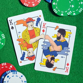Two illustrated playing cards on green felt show king figures fist-bumping. Surrounding the cards are red, green, and blue poker chips.