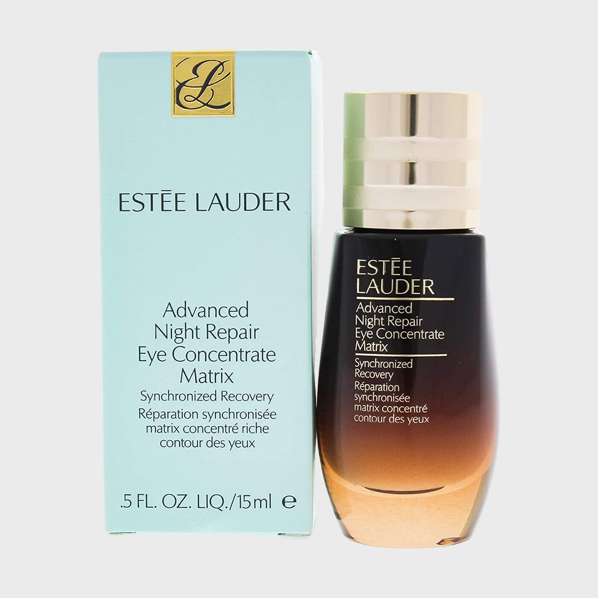 Bottle stands beside its box, labeled "EstÃ©e Lauder Advanced Night Repair Eye Concentrate Matrix," amidst a plain, light gray background.