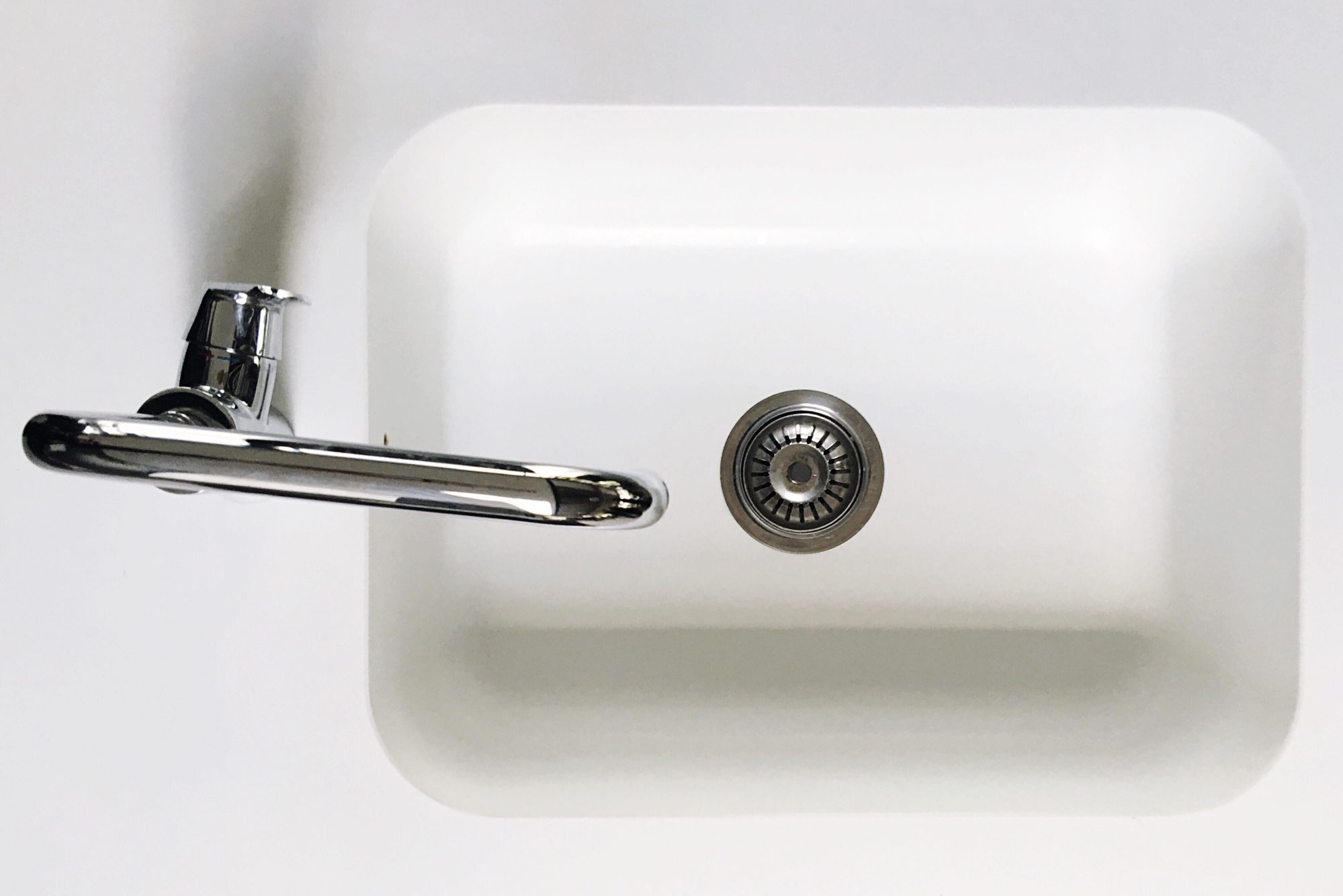 Directly Above Shot Of Kitchen Sink And Faucet