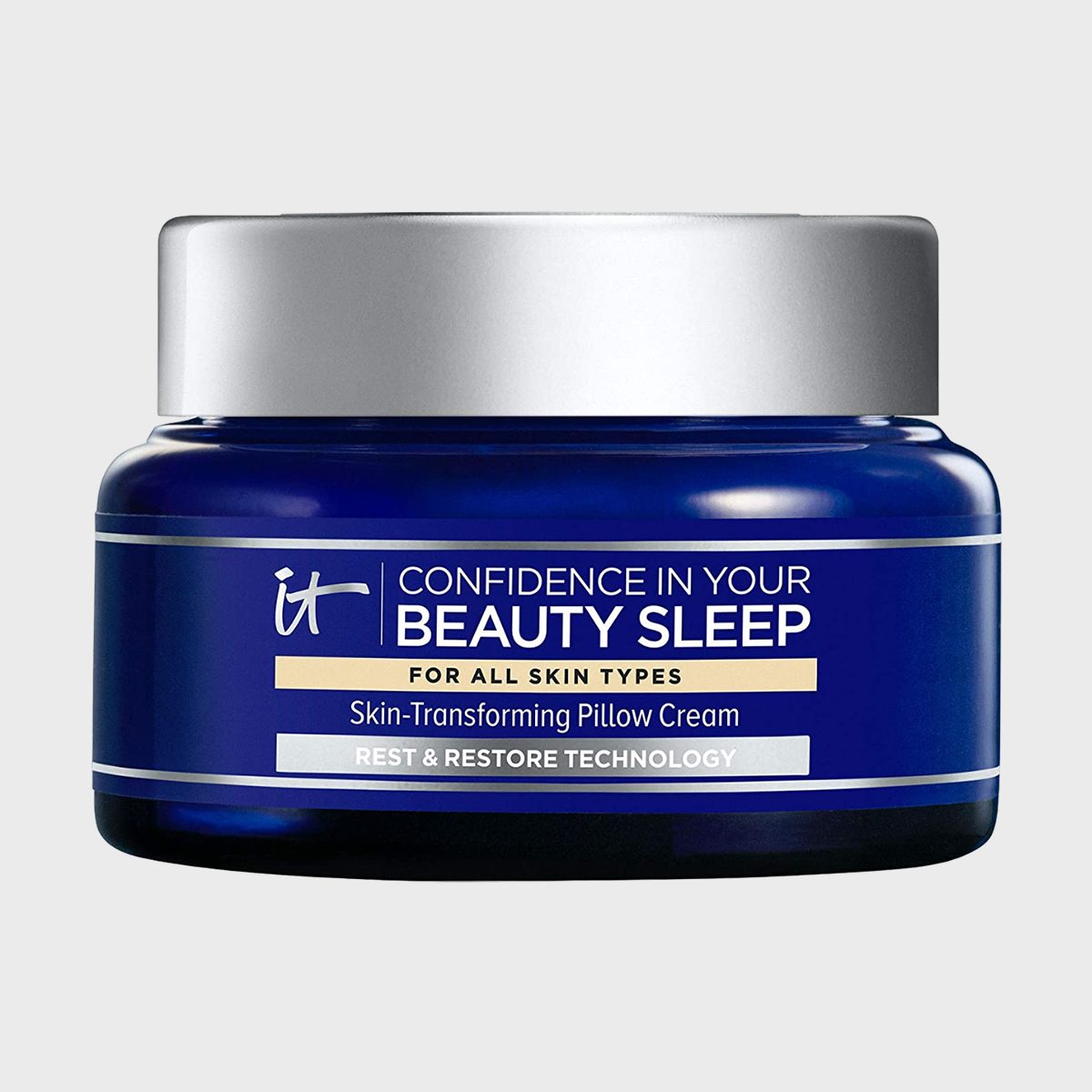 A dark blue jar labeled "Confidence in Your Beauty Sleep" holds skin-transforming pillow cream, featuring rest and restore technology for all skin types.