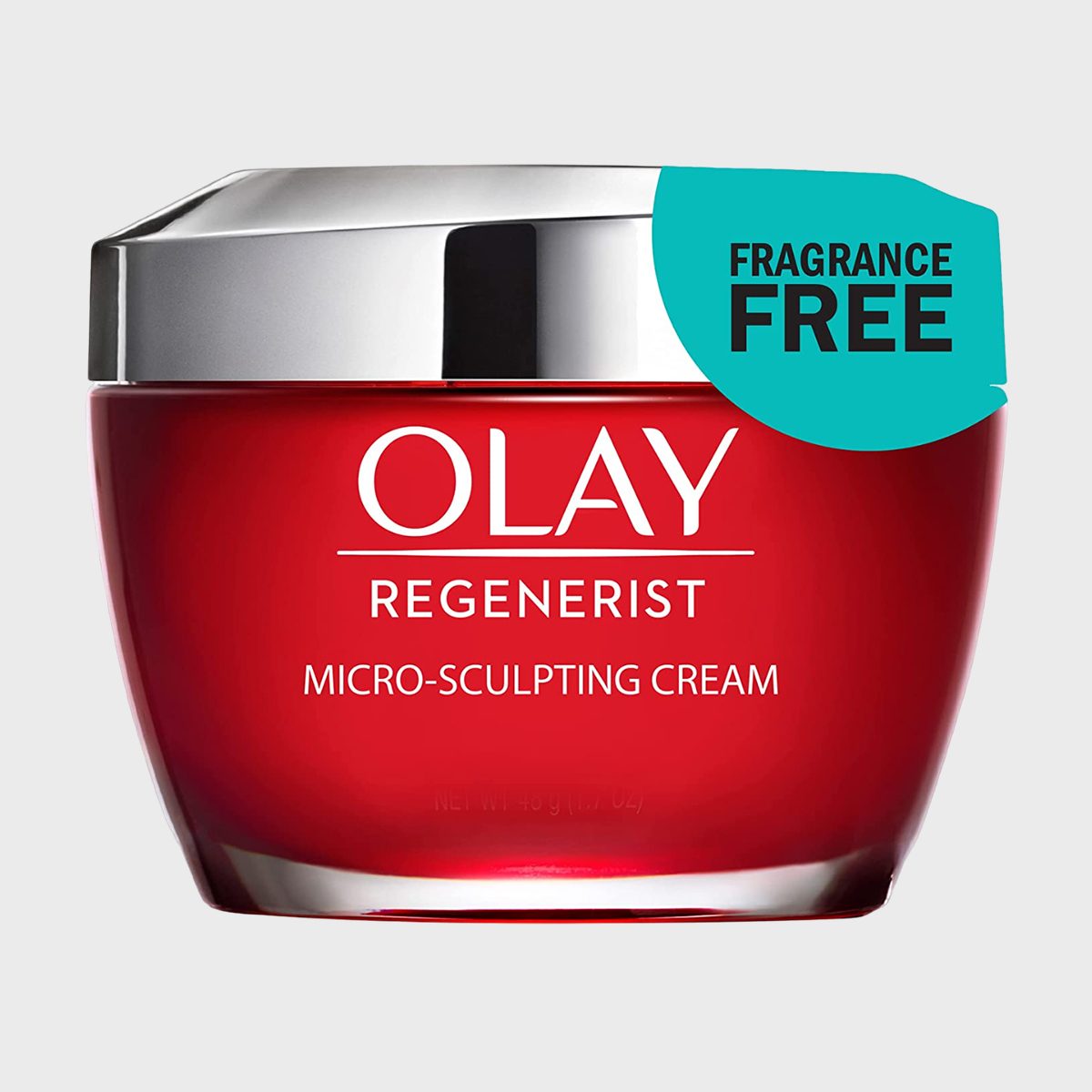 Red jar labeled "OLAY Regenerist Micro-Sculpting Cream" holds fragrance-free cream, set against a plain gray background.