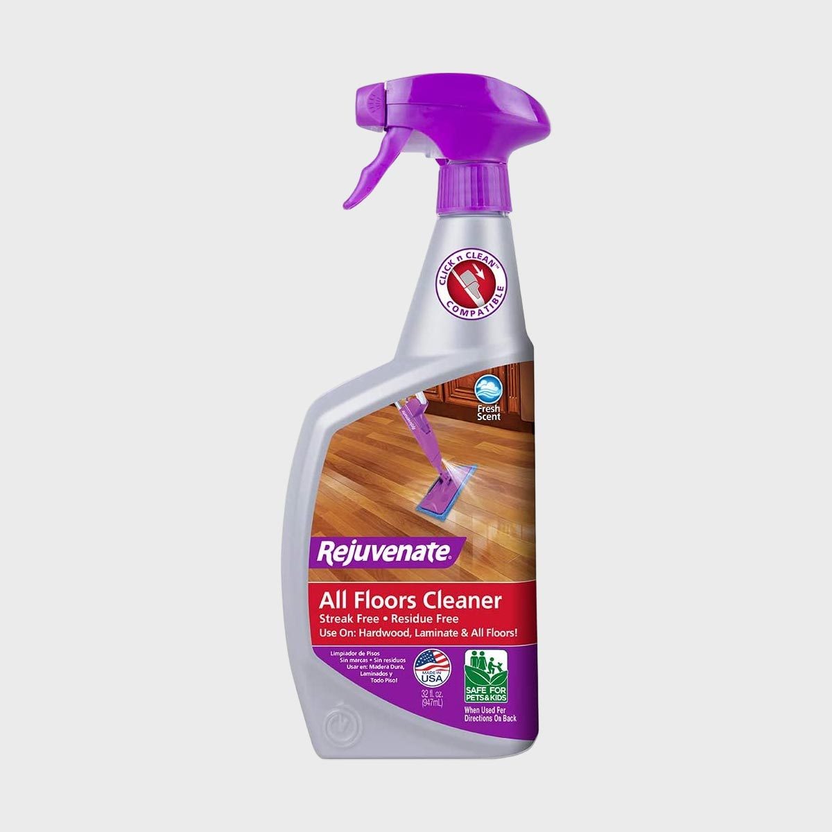 Spray bottle displays a fresh scent floor cleaner; suitable for hardwood and laminate flooring. Purple trigger against a wooden floor background.