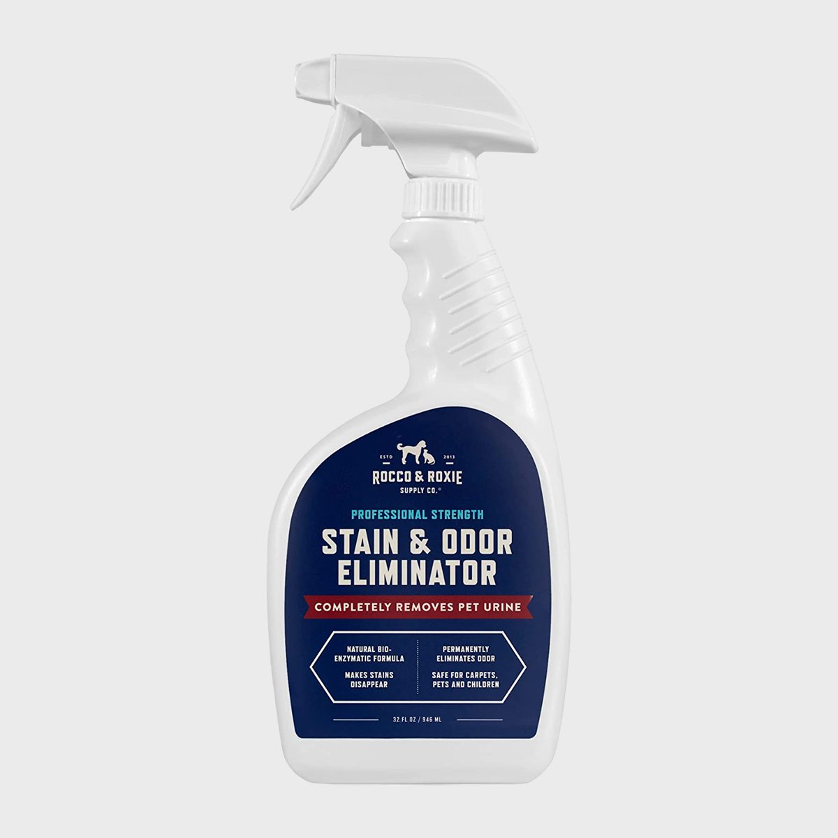 Spray bottle labeled "Stain & Odor Eliminator" removes pet urine, promoted as safe for carpets and pets, with bio-enzymatic formula. White bottle, blue label.