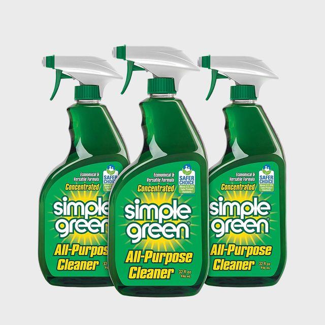 Three green spray bottles labeled 