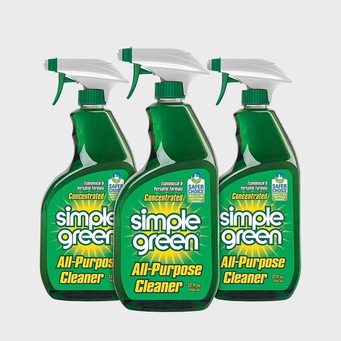 Three green spray bottles labeled 