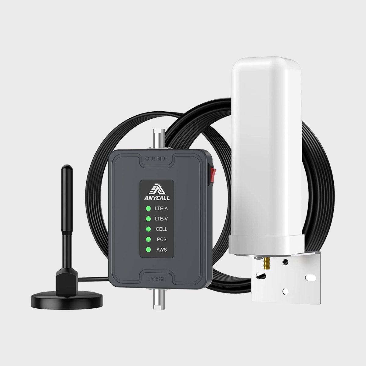 Device displays multiple signal indicators; connected to antennas via cables; set against a plain background. Text: "ANYCALL LTE-A LTE-V CELL PCS AWS".