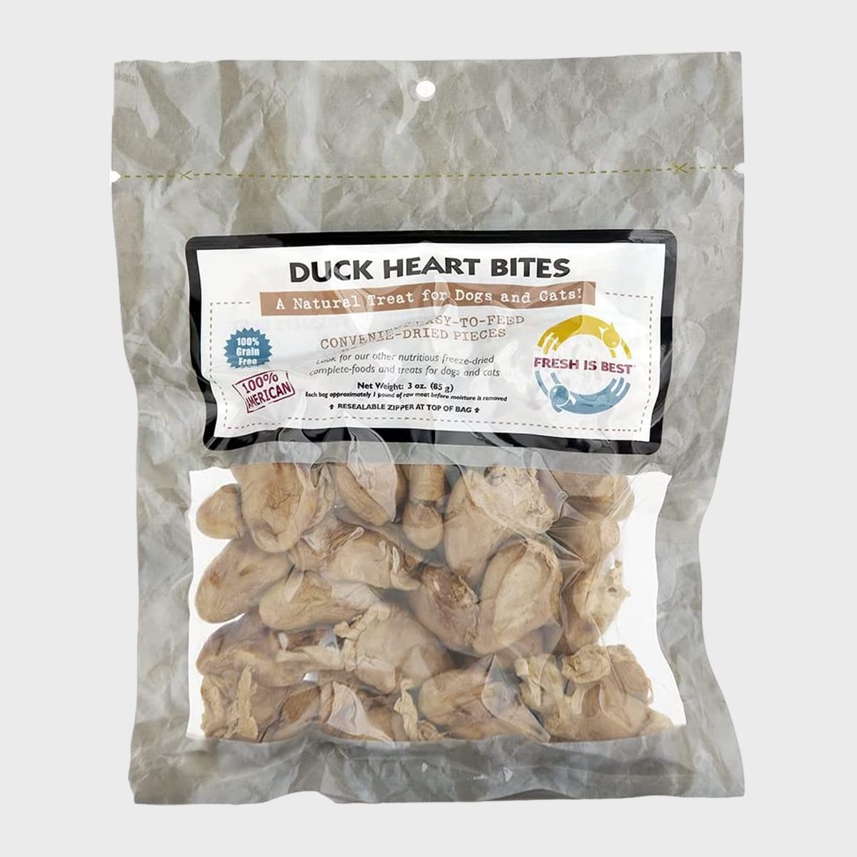 Sealed bag displays duck heart bites, labeled as natural treats, for pets; placed against a plain background. Text reads, "DUCK HEART BITES," among others.