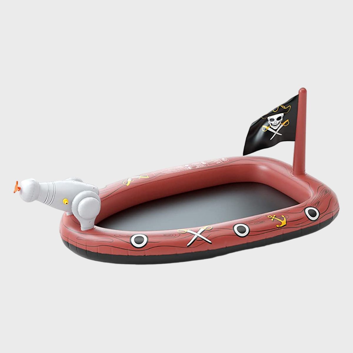 Inflatable pirate-themed play boat with cannon and flag, decorated with swords and anchors, set against a plain background.