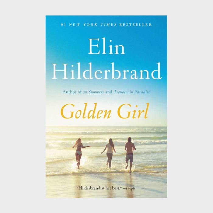 Three people run toward the ocean under a clear sky. The book cover text reads: 