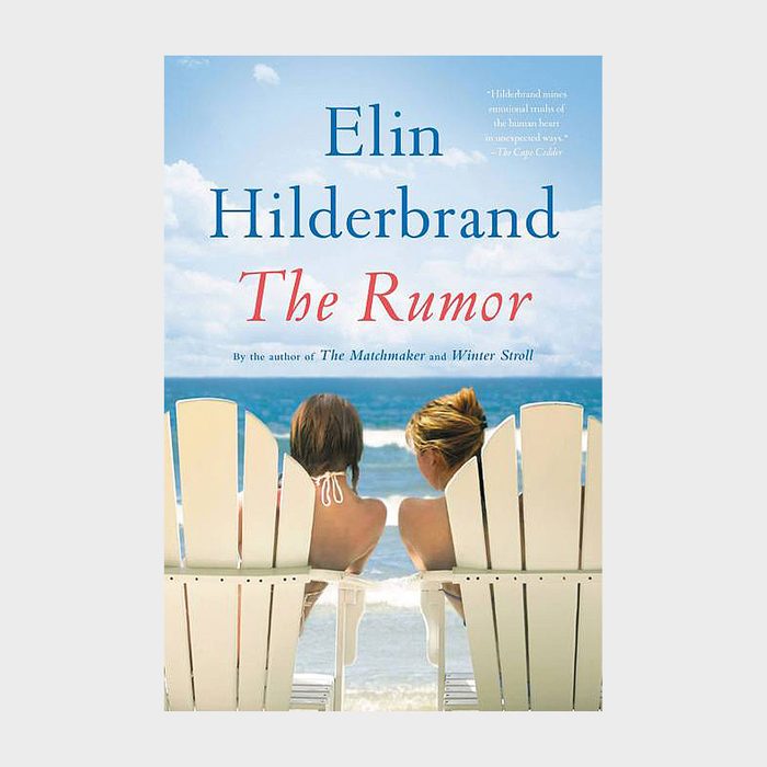 Two women sit on beach chairs facing the ocean; bright blue sky and gentle waves in the background. Text: 