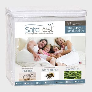 Package displays family smiling under covers, advertising 