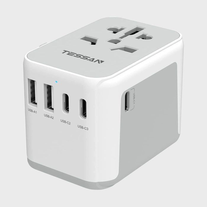 Power adapter provides multiple USB ports and international sockets; labeled 
