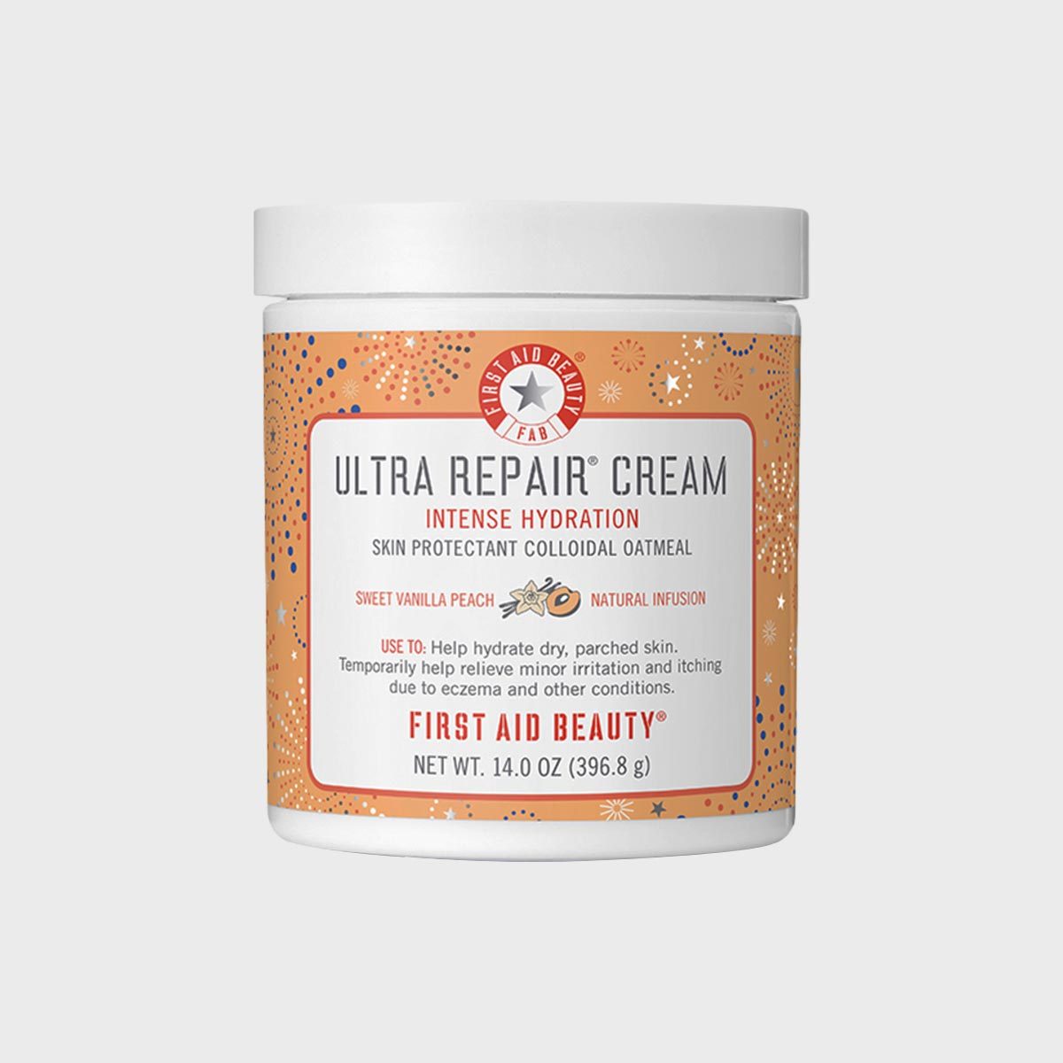 Jar displays "Ultra Repair Cream" offering intense hydration, designed for dry skin, featuring colloidal oatmeal, sweet vanilla peach, and natural infusion by First Aid Beauty.