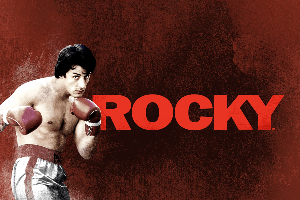 A boxer in fighting stance with gloves, against a textured, dark red background. Text reads "ROCKY" in large, bold letters.