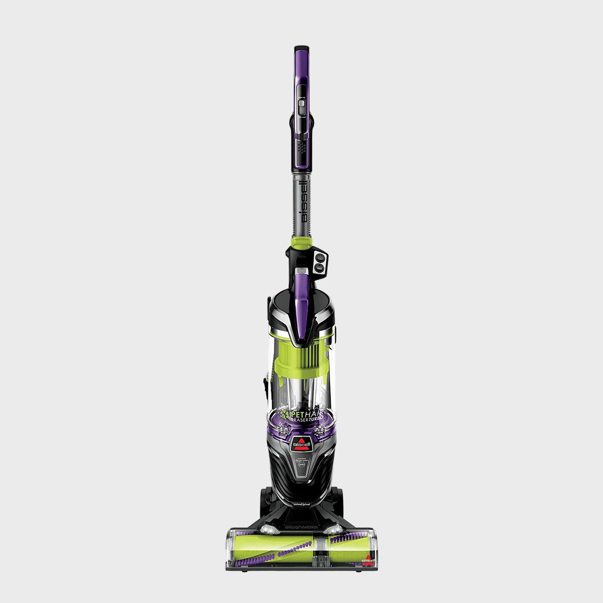 A purple and green upright vacuum cleaner stands upright against a plain backdrop.
