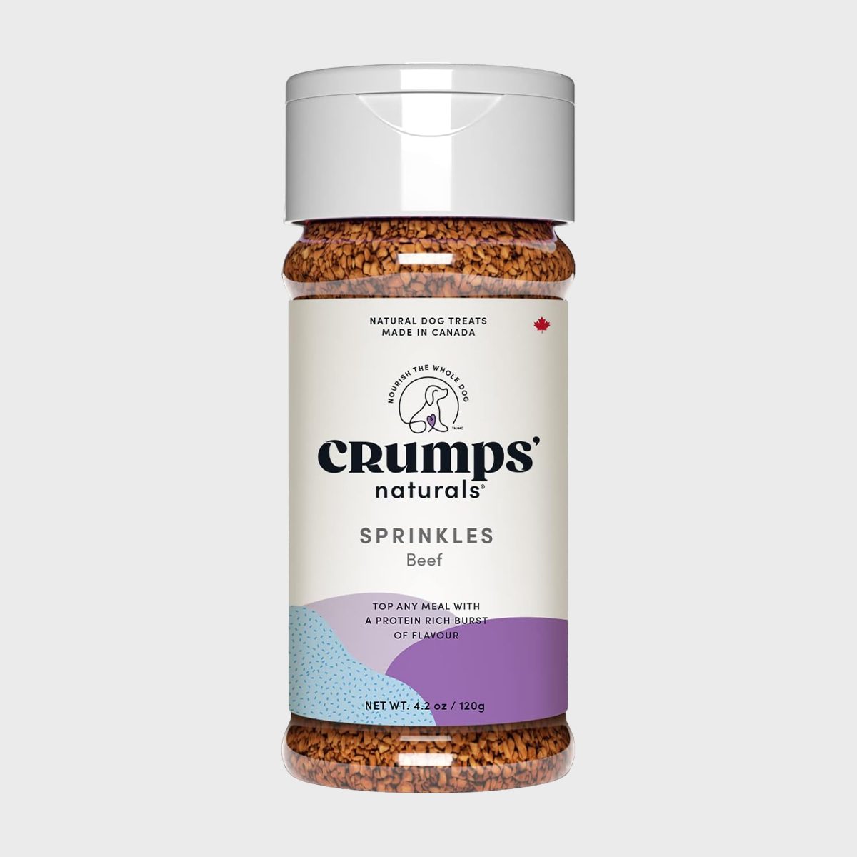 Jar displays Crumps' Naturals Sprinkles, beef flavor, labeled as natural dog treats, made in Canada. Contains brown sprinkles with a white and purple label.