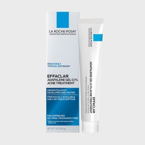 Tube stands upright beside box, showcasing La Roche-Posay Effaclar Adapalene Gel 0.1% Acne Treatment. White and blue packaging, emphasizing dermatologist development.