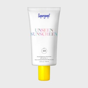 A white sunscreen tube reads 