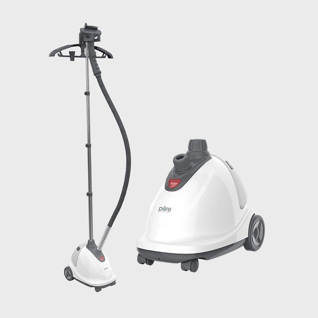 Garment steamer standing upright; hose connects to a detachable, wheeled base with a nozzle. Gray and white colors, set against a plain background.