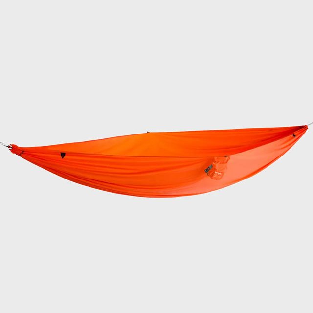 Orange hammock hangs, displayed horizontally, against a plain gray background.