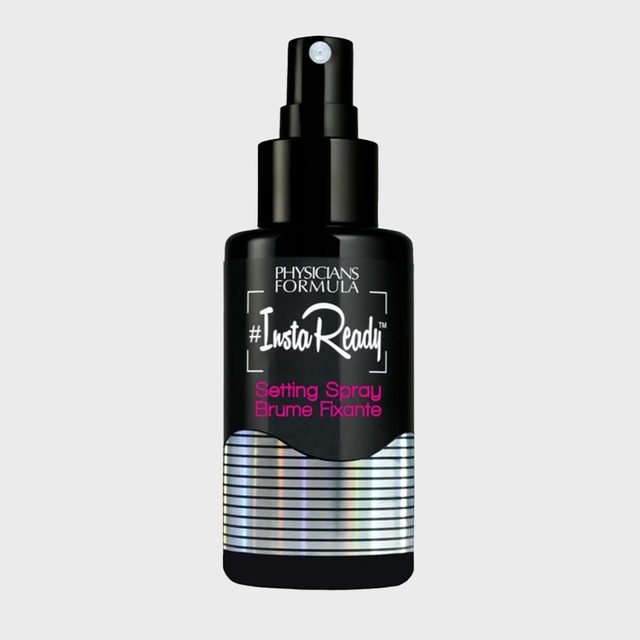 Black spray bottle, labeled 