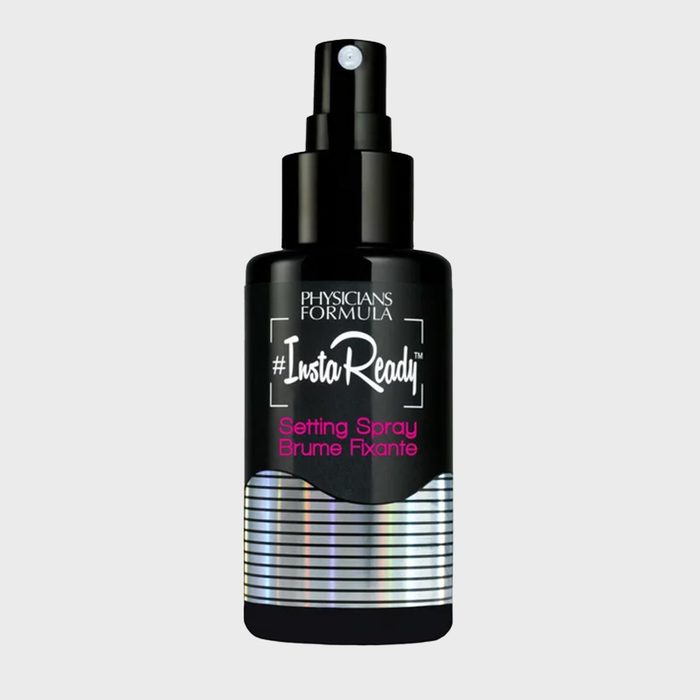 Black spray bottle, labeled 